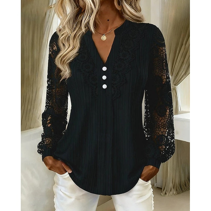 Black ribbed blouse with crochet lace sleeves and V-neckline